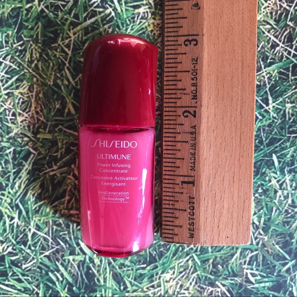 Shiseido Ginza Tokyo Red Makeup Bag with .33 oz Ultimune Deluxe Sample Included